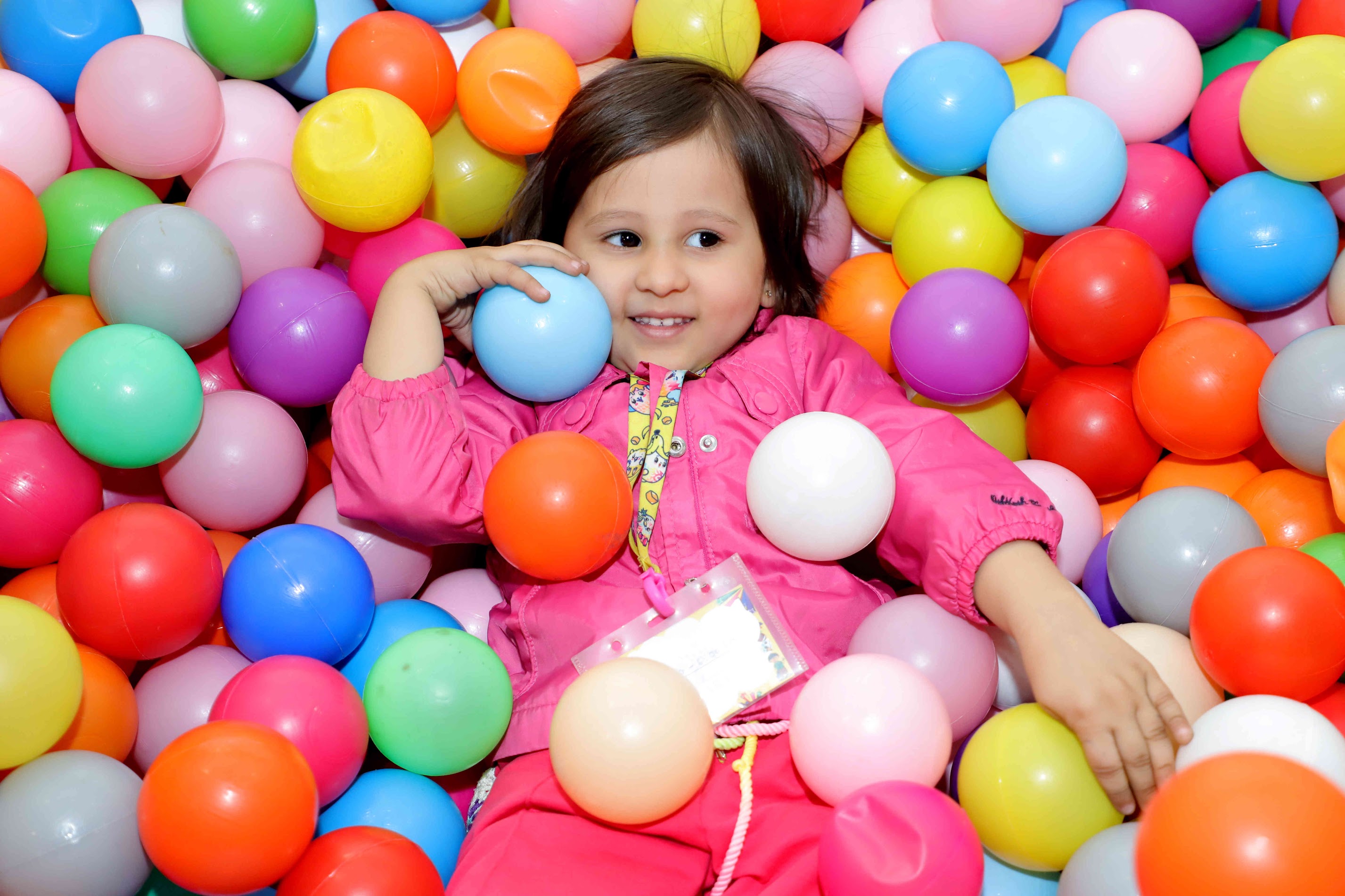 A child playing in Evaara’s colorful ball pit